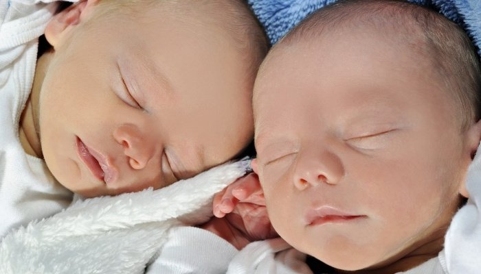 Twin Babies Sleeping Together