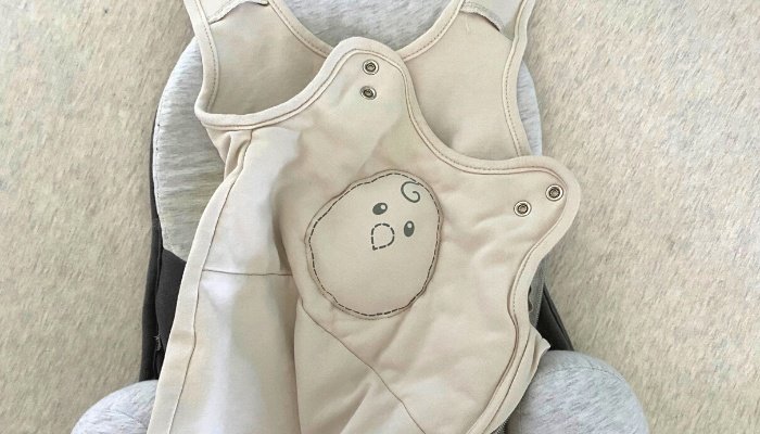 Open Nested Bean Swaddle in Crib