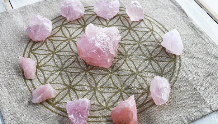 Healing ring of rose quartz crystals.