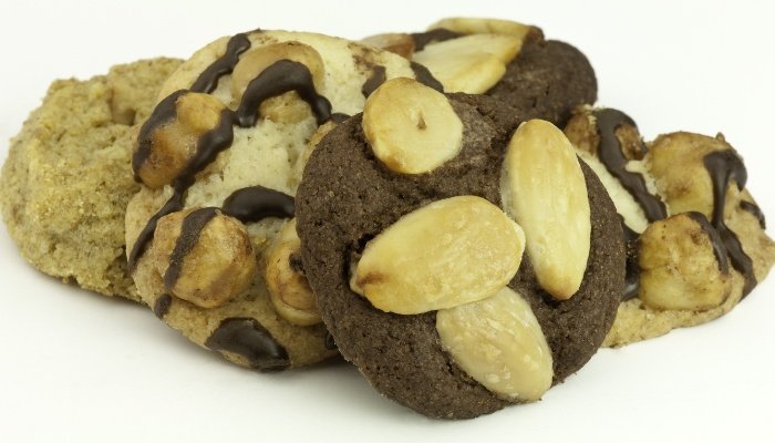 Assorted deluxe homemade cookies on a white background.
